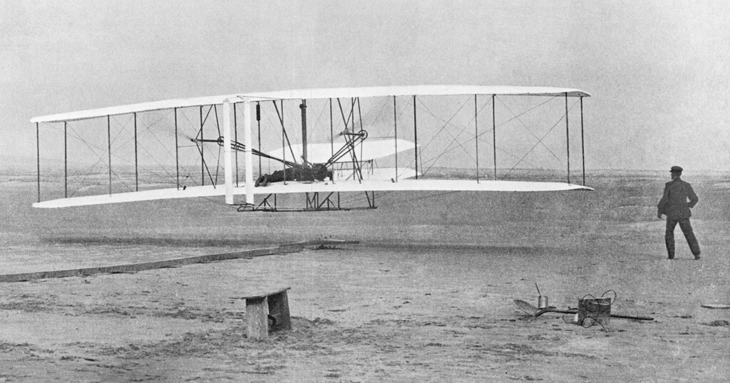Photo of the Wright brothers' first powered flight on the Outer Banks
